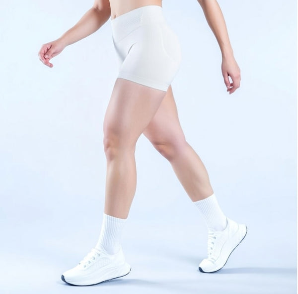 Model wearing Empower Olive Shorts Model wearing Empower Blossom Shorts