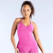 Model wearing Empower Olive Fitted Tank Top Model showcasing the Empower Grape Thistle Fitted Tank Top in a stylish pose. Model wearing Empower Scarlet Fitted TankTop Model wearing Empower Blossom Fitted Tank Top