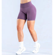 Model wearing Empower Olive Shorts Model wearing Empower Blossom Shorts
