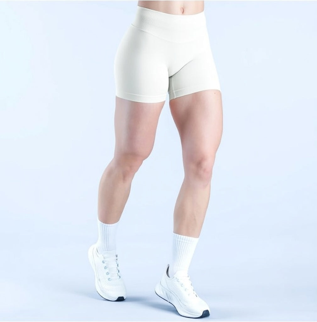 Model wearing Empower Olive Shorts Model wearing Empower Blossom Shorts