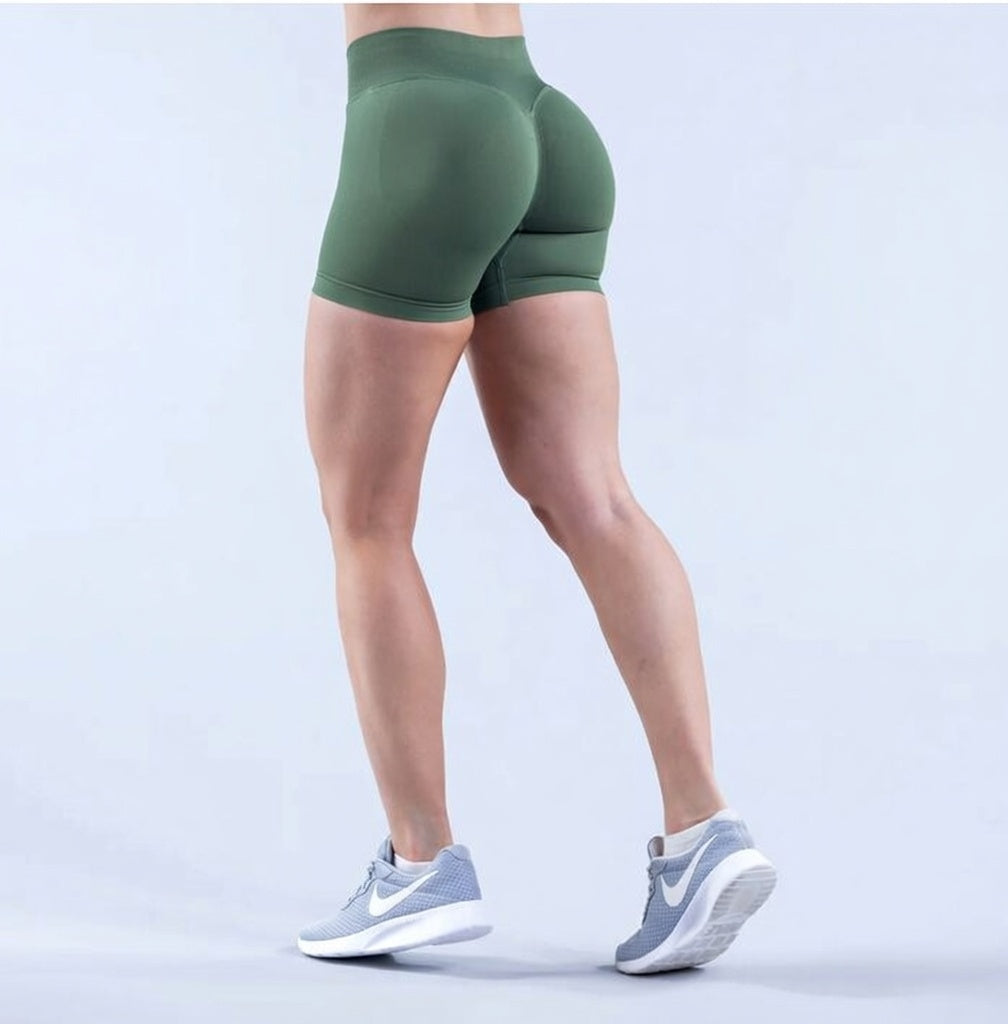 Model wearing Empower Olive Shorts Model wearing Empower Blossom Shorts