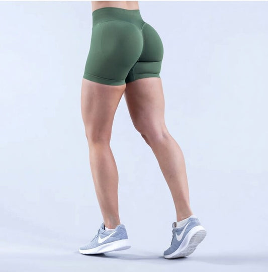 Model wearing Empower Olive Shorts Model wearing Empower Blossom Shorts