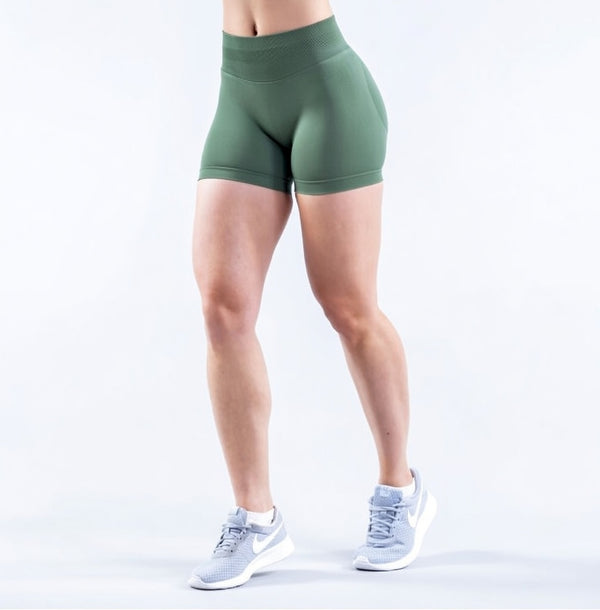 Model wearing Empower Olive Shorts Model wearing Empower Blossom Shorts