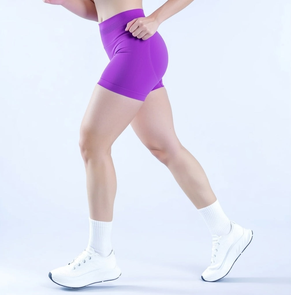 Model wearing Empower Olive Shorts Model wearing Empower Blossom Shorts