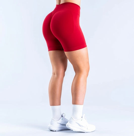 Model wearing Empower Olive Shorts Model wearing Empower Blossom Shorts